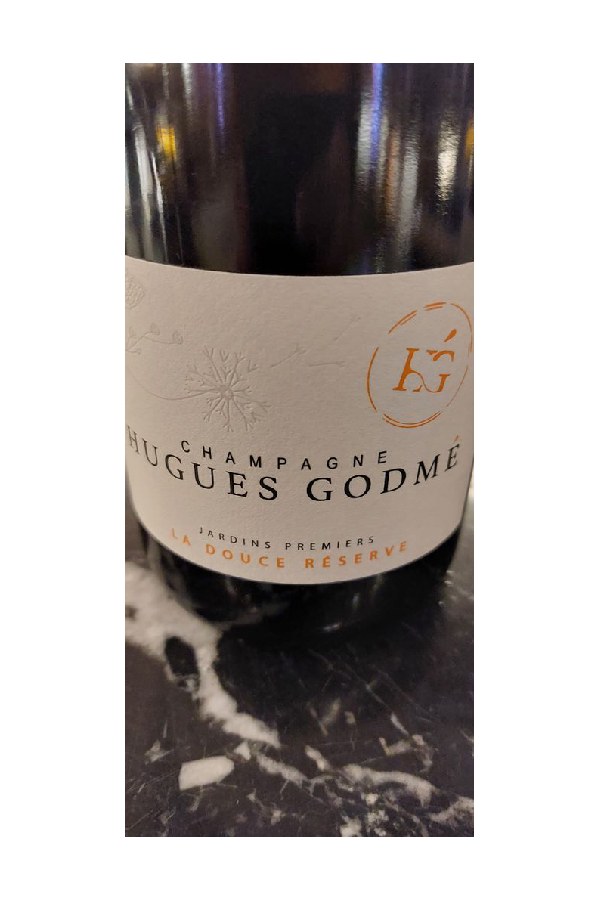 Bottle of Champagne Hugues Godme Jardins Premiers-La Reserve 1ER Cru